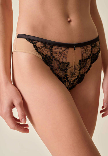 Front view of a women model wearing Gossard black/nude microfibre Brief