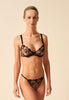General view of a women model wearing Gossard black/nude microfibre Non Padded Plunge Bra