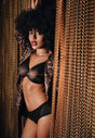 General view of a women model wearing Gossard black microfibre Short