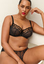 General view of a women model wearing Gossard black microfibre Brief