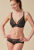 General view of a women model wearing Gossard black/nude microfibre High Apex Padded Bra