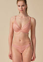 Full-body view of a women model wearing Gossard blush microfibre Thong