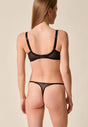 General view of a women model wearing Gossard leopard print  Thong
