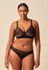 Full-body view of a women model wearing Gossard black microfibre Bralet