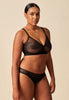 General view of a women model wearing Gossard black microfibre Bralet