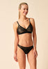 General view of a women model wearing Gossard black microfibre Bralet