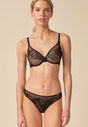 Full-body view of a women model wearing Gossard black microfibre Brief