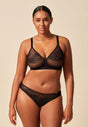 General view of a women model wearing Gossard black microfibre Brief