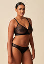 General view of a women model wearing Gossard black microfibre Brief
