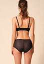 General view of a women model wearing Gossard black microfibre Sheer Bra