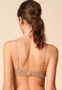 General view of a women model wearing Gossard beige microfibre Sheer Bra
