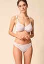 General view of a women model wearing Gossard white microfibre Sheer Bra
