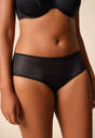 Front view of a women model wearing Gossard black microfibre Short
