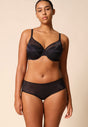Full-body view of a women model wearing Gossard black microfibre Short