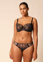 General view of a women model wearing Gossard black microfibre Brief