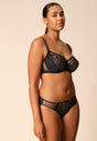 General view of a women model wearing Gossard black microfibre Brief