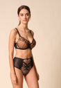 General view of a women model wearing Gossard black microfibre Deep Brief