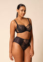 General view of a women model wearing Gossard black microfibre Deep Brief