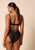 General view of a women model wearing Gossard black microfibre Deep Brief