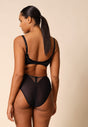 General view of a women model wearing Gossard black microfibre Deep Brief