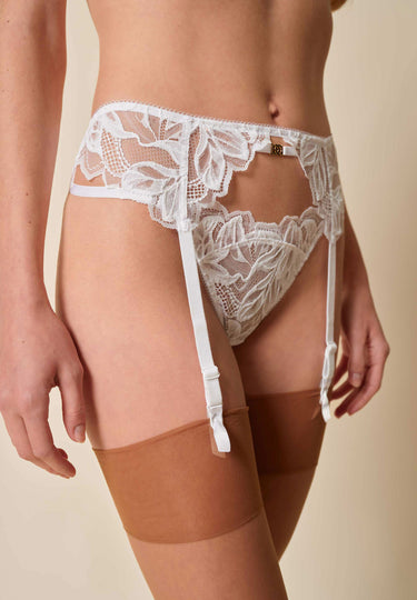 Front view of a women model wearing Gossard white microfibre Suspender