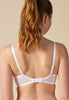 Back view of a women model wearing Gossard white microfibre Padded Plunge Bra