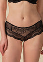 Front view of a women model wearing Gossard black microfibre Short