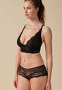 General view of a women model wearing Gossard black microfibre Short
