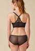 General view of a women model wearing Gossard black microfibre Short