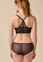 General view of a women model wearing Gossard black microfibre Short