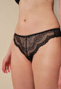 Front view of a women model wearing Gossard black microfibre Thong
